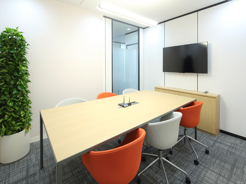 The conference room is equipped with a TV for videoconferencing and other activities.